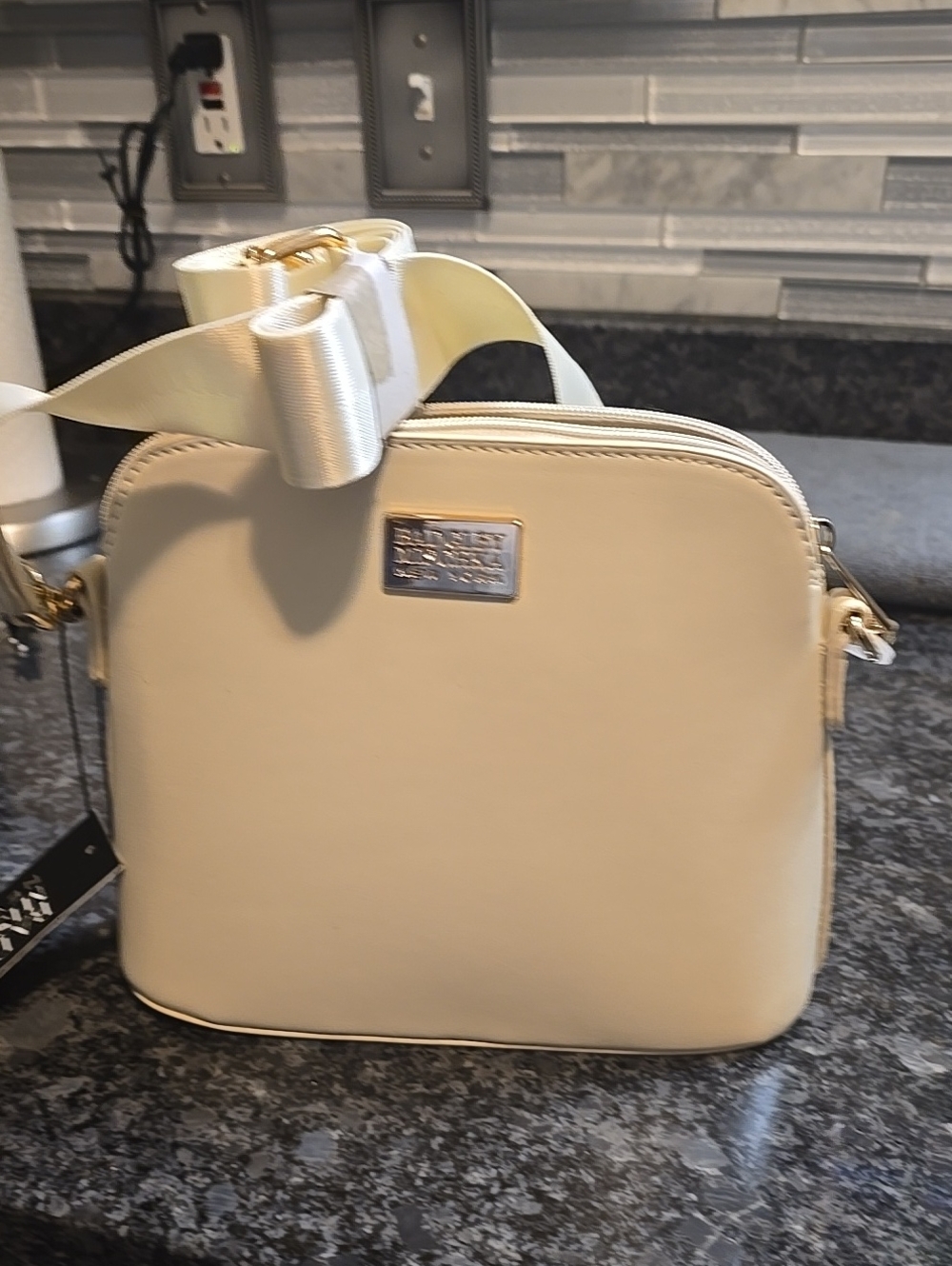 Bradgley Mischka NY Cream Crossbody Bag with Gold Plaque and Adjustable Strap